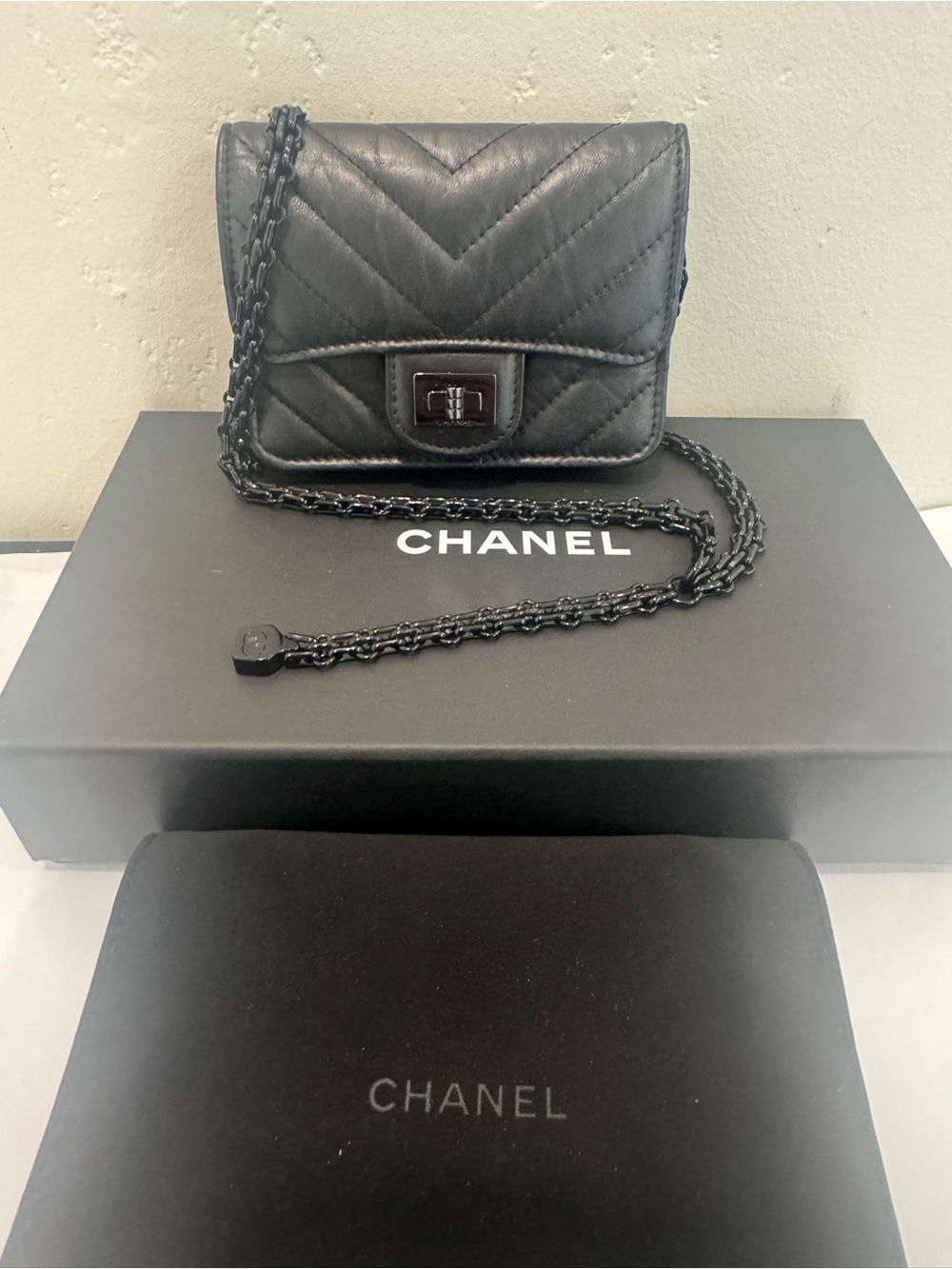 CHANEL Chevron Quilted mini WOC bag